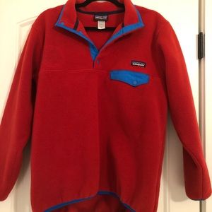 Red synchilla Patagonia with blue trim